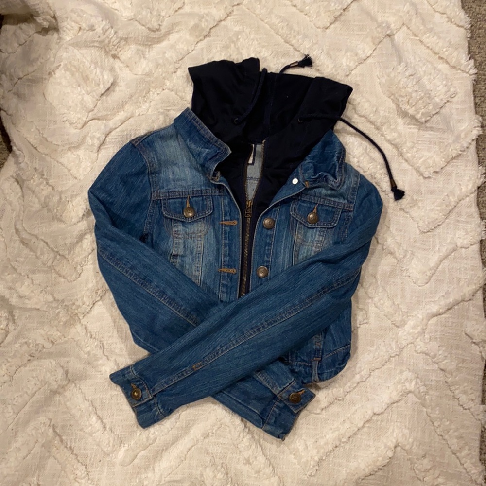 Denim jacket with cloth hood.